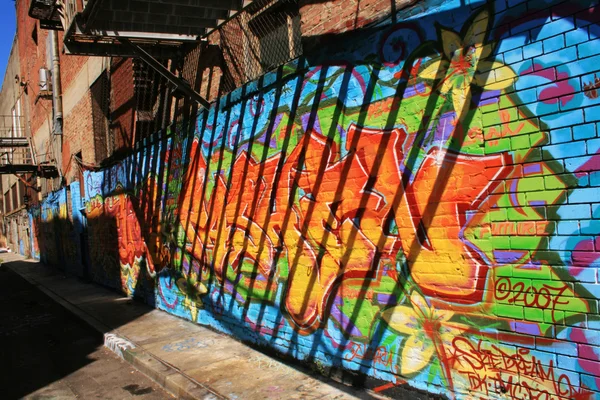 Graffiti w ścianie — Zdjęcie stockowe