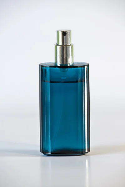 Blue bottle of perfume — Stock Photo, Image