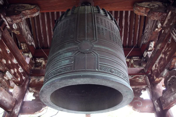 Stock image The boom of a temple bell