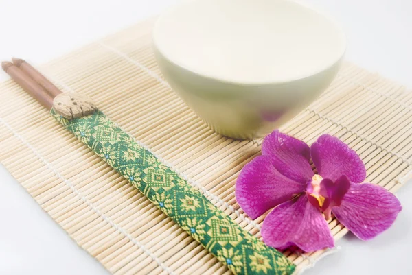 Chopsticks, Bowl, and Orchid — Stock Photo, Image