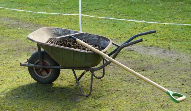 Wheelbarrow with manure clipart