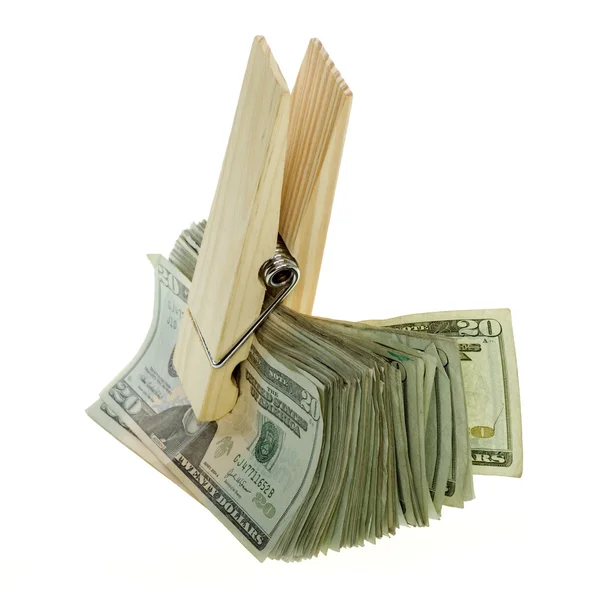 Pinza de madera sobredimensionada Sosteniendo una pila de billetes de veinte dólares — Foto de Stock