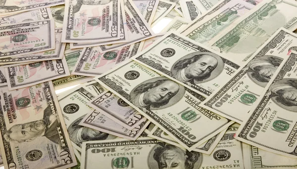 Fundo: Money Pile of US Currency $100, $50 Dollar Bills — Fotografia de Stock
