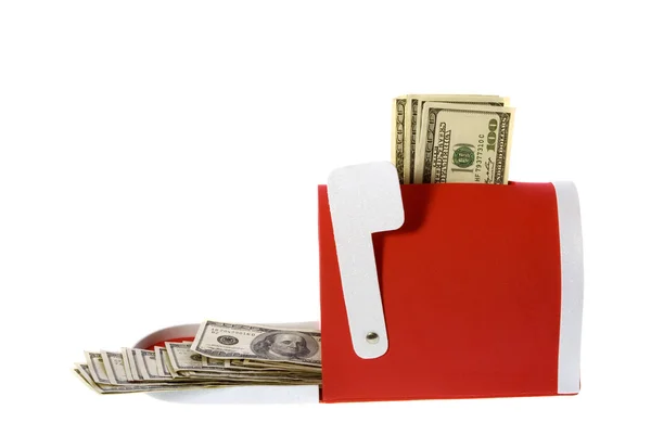 Hundra dollar räkningar rinner ut från en röd postlåda — Stockfoto
