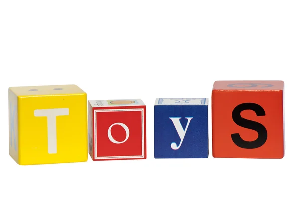 Lição por escrito a palavra brinquedos — Fotografia de Stock