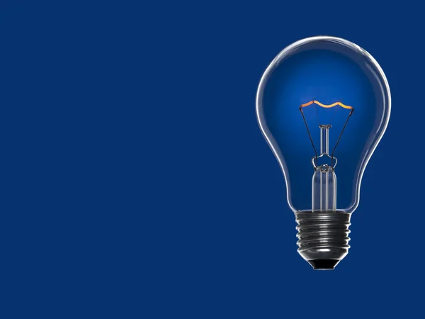 Bulb light over blue — Stock Photo, Image