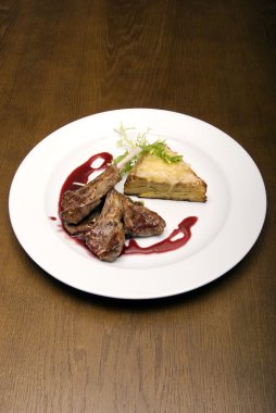 Fried meat on white plate