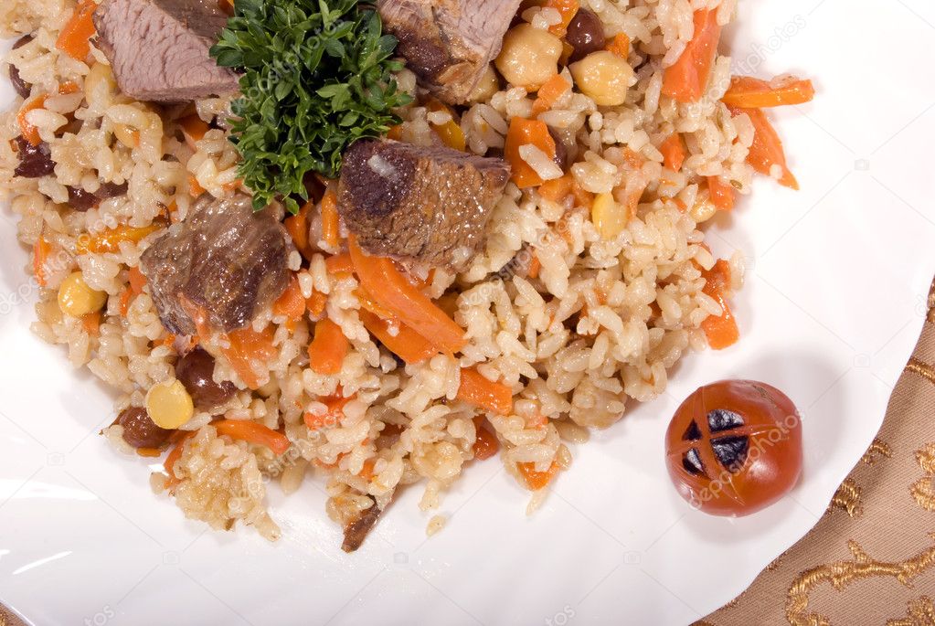Pilaf with meat — Stock Photo © HASLOO 4013884