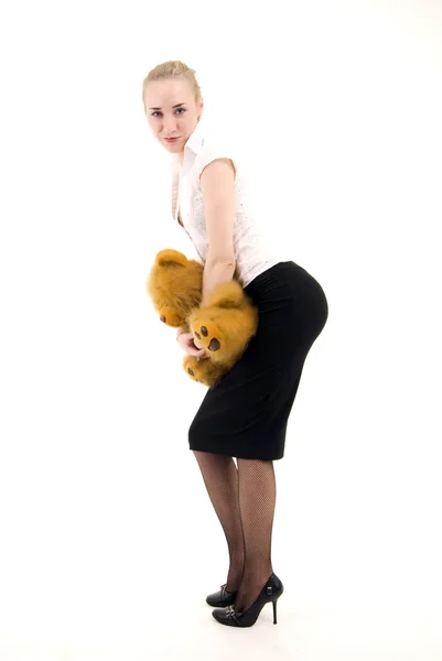 Молодая женщина с плюшевым мишкой — стоковое фото