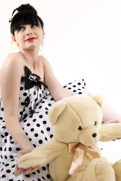 Fiatal nő teddy macival — Stock Fotó