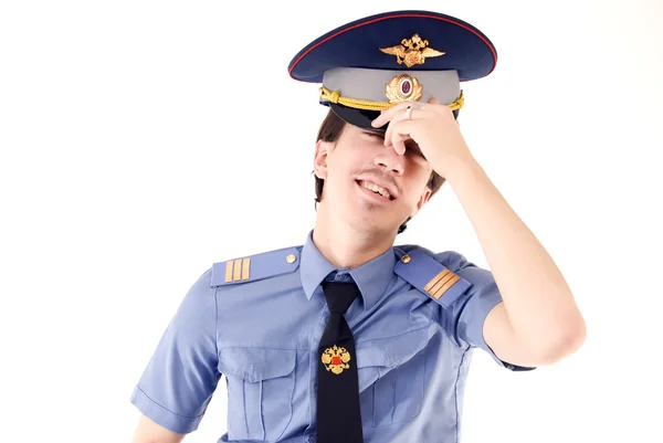 Młody Policjant Zmęczony Smilingisolated Biały — Zdjęcie stockowe