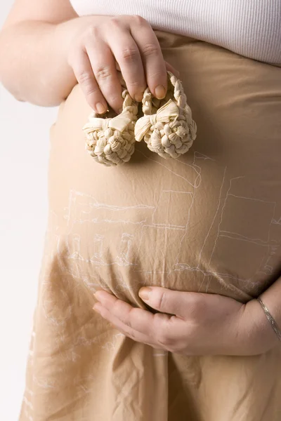 怀孕，肚子，妈妈的手 — 图库照片