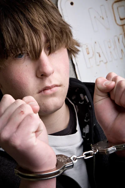 Teen in handcuffs - crime — Stock Photo, Image