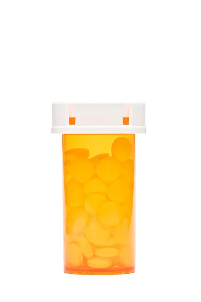 Pillen in fles geïsoleerd — Stockfoto