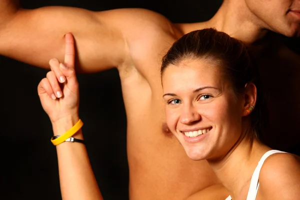 Sorriso Menina e músculos — Fotografia de Stock