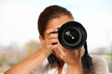 Woman taking pictures clipart