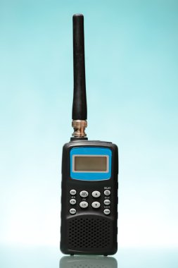 Radio scanner over blue background clipart