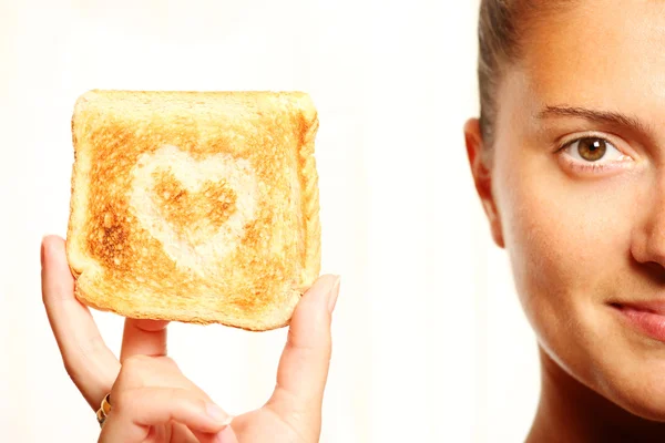 Девушка и тост — стоковое фото