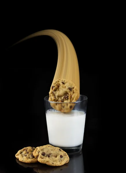 stock image Three chocolate chip cookies swoop