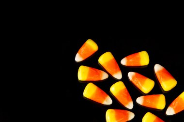 Candy corn on a black clipart