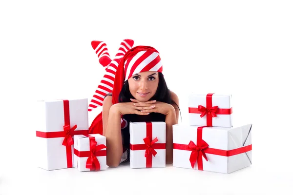 Santa girl is with a bunch of gifts. Holidays Christmas and New Royalty Free Stock Photos