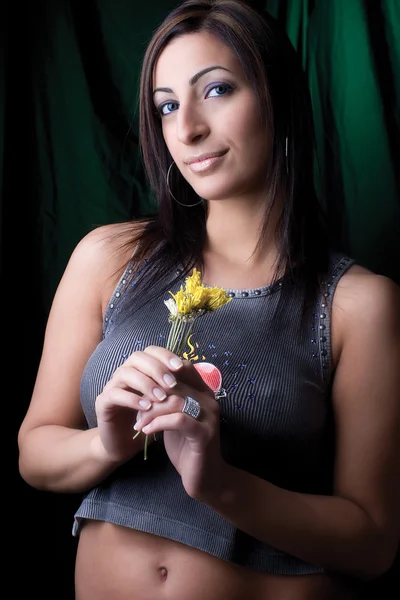 Fashion model - holding flower — Stock Photo, Image