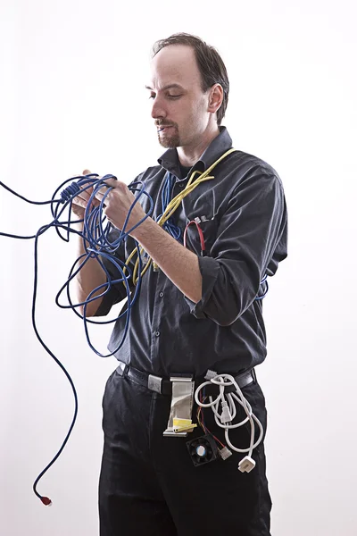 stock image TECHNICIAN EATING CABLE