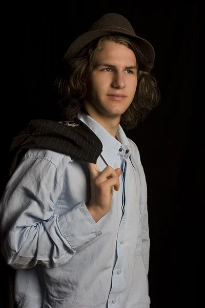 Подросток в костюме в шляпе — стоковое фото