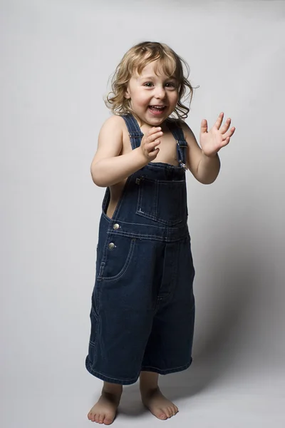 Toddle in overall clapping — Stock Photo, Image