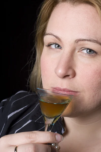Woman having a drink — Stock Photo, Image