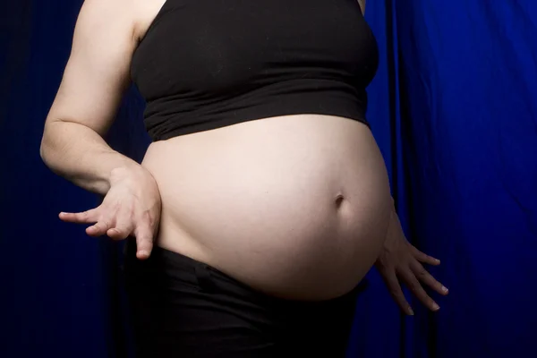 Showing off belly — Stock Photo, Image