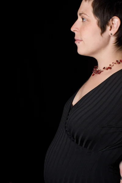 Profil för en gravid kvinna — Stockfoto