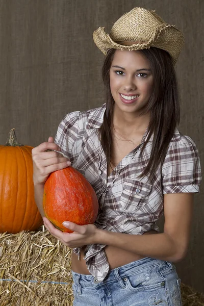 A cowgirl and her squashes — Stock Photo, Image
