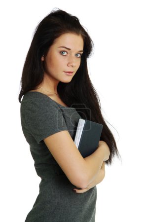 Femme avec le livre dans les mains 