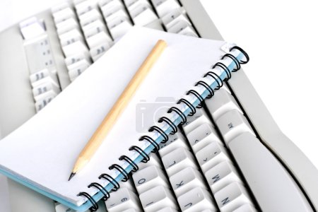 Carnet sur le clavier 