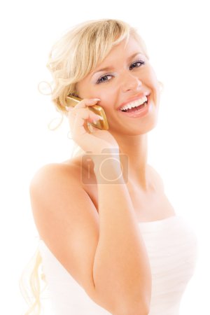 Belle blonde parle par téléphone et sourit 