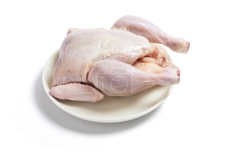 poulet cru sur assiette