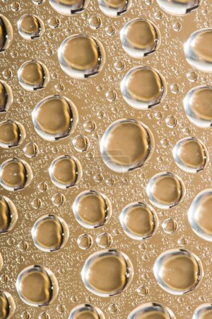 Bulles d'eau abstraites dorées 